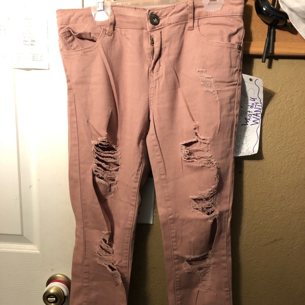 Rose colored like ripped jeans